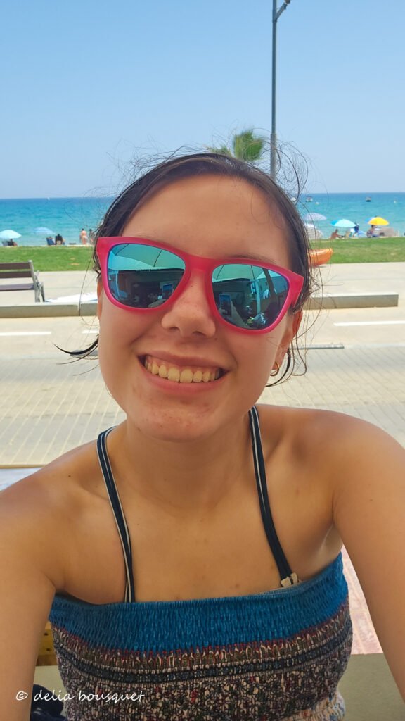 Enjoying my coke and tapas at the beach
